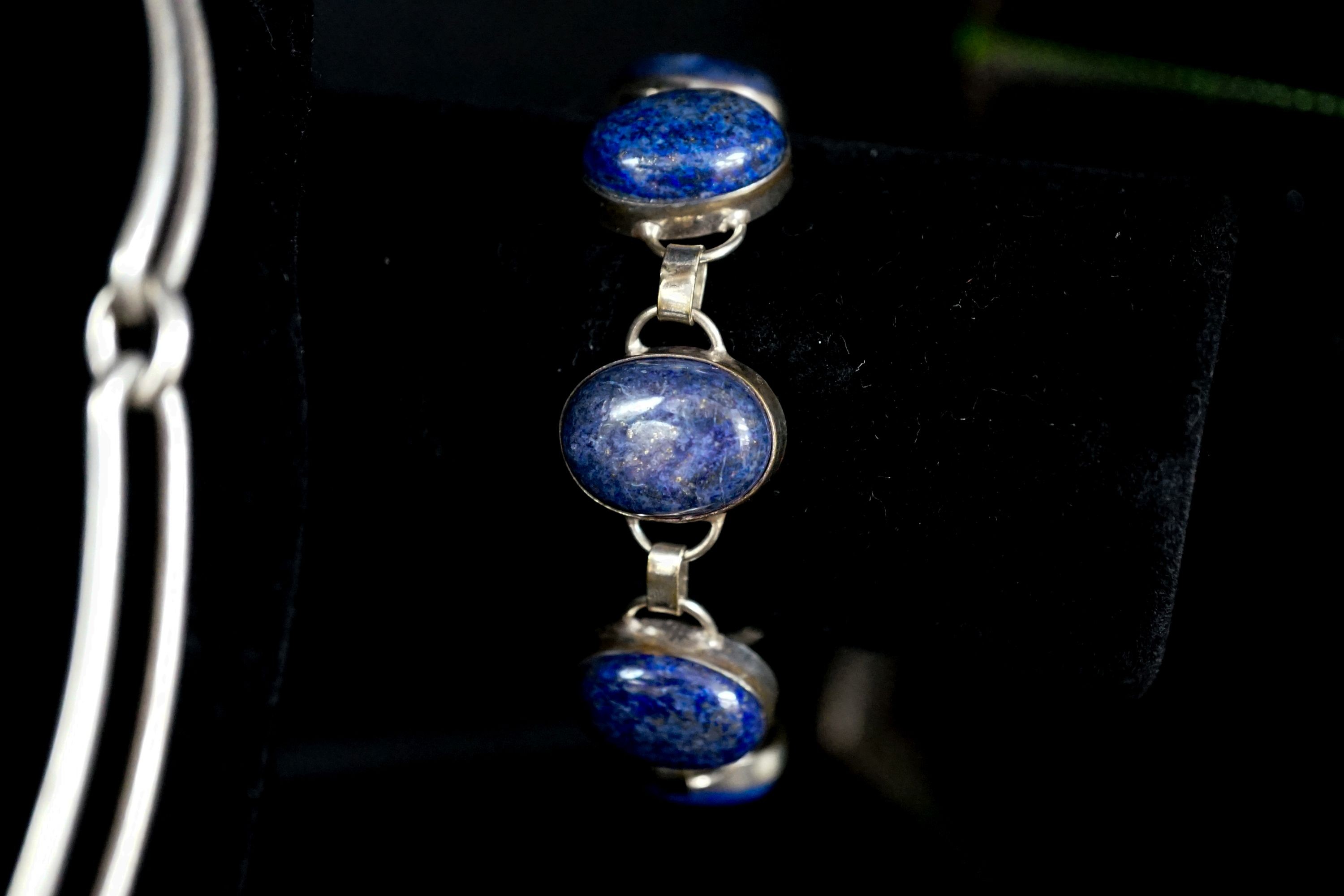 A 1980's Danish sterling 925 and lapis lazuli set necklace by N.E. From, 38cm and a white metal and lapis lazuli set bracelet.